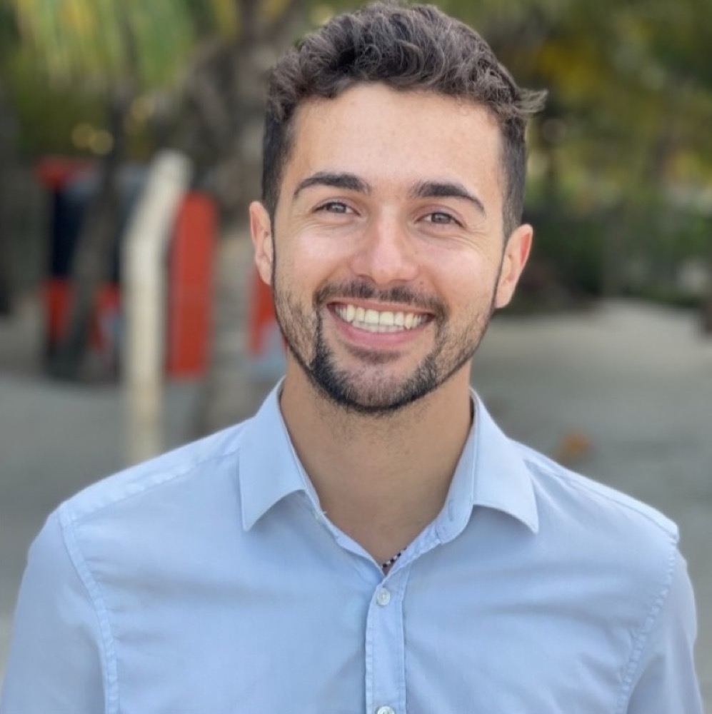 Jimi Cohen smiling outdoors