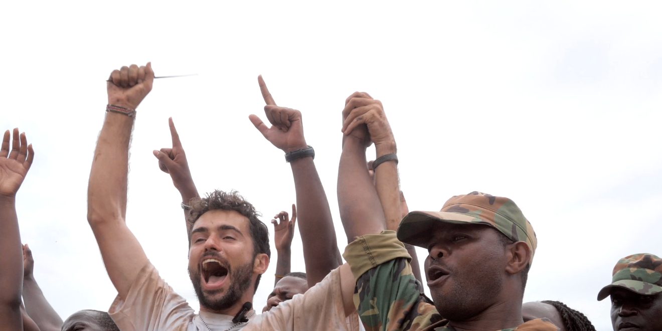 Jimi Cohen celebrating with the Kenyan community and rangers at the end of the 24 hour record planting